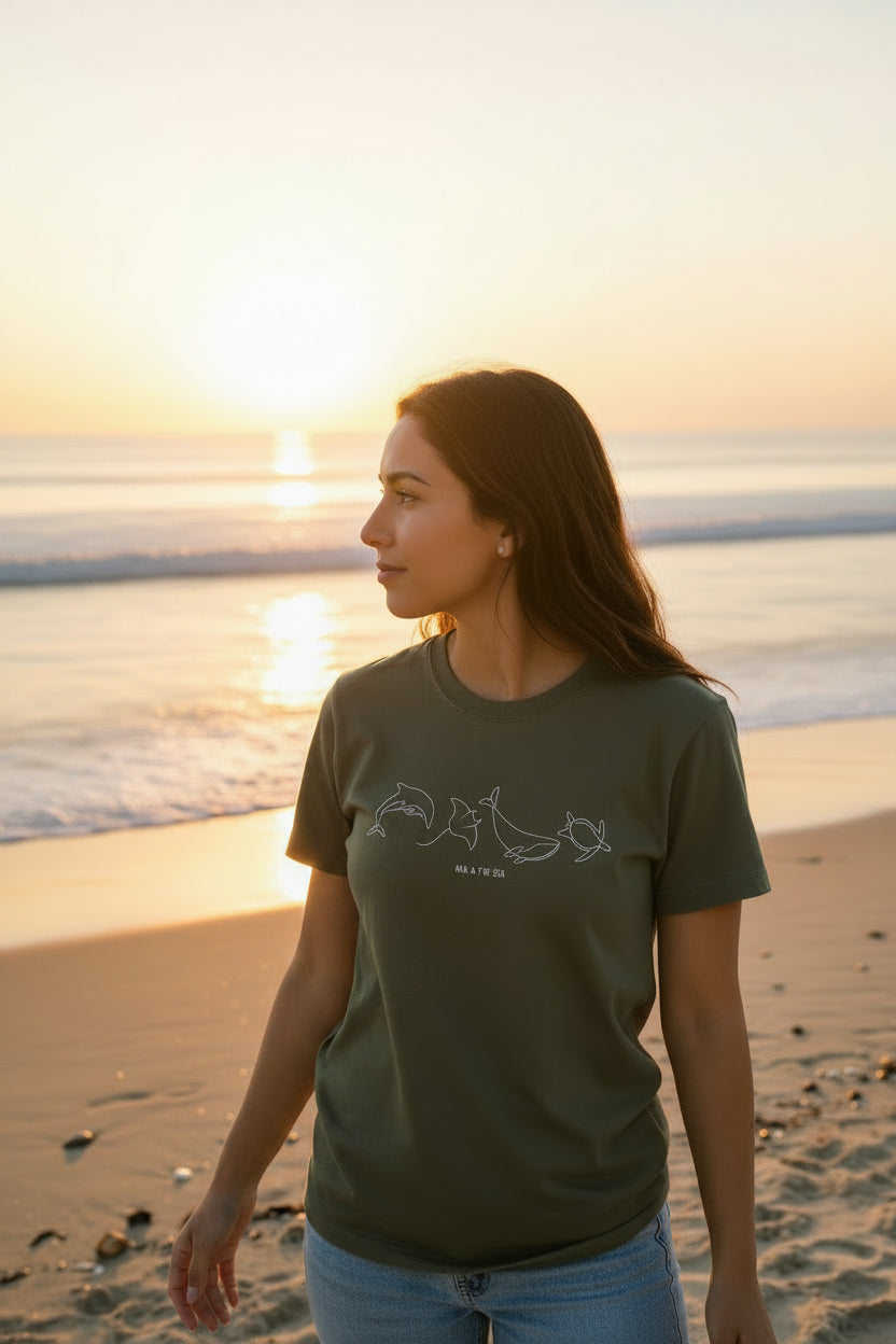 Washed charcoal t-shirt with a graphic design on a white background